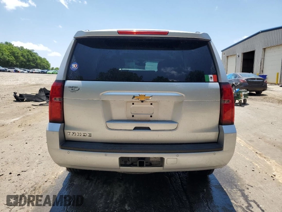 2017 Chevrolet Tahoe LS with VIN 1GNSCAKC4HR403104, listed as a Copart auction lot 57823865 with 185,407 mi miles and Salvage title. Bid and sale history available at DreamBid. Image 6.
