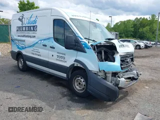 2016 Ford Transit Cargo z VIN 1FTYE1CM1GKA29370, wystawiony jako IAAI lot #42177908 z przebiegiem 155 718 mil mil oraz . Historia ofert i sprzedaży dostępna na DreamBid. Obrazek 1.