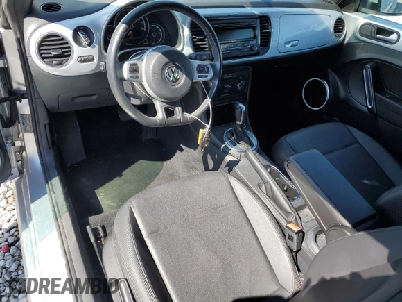 2015 Volkswagen Beetle 1.8T with VIN 3VW517AT8FM810709, listed as a Copart auction lot 48065314 with 61,924 mi miles and Salvage title. Bid and sale history available at DreamBid. Image 8.