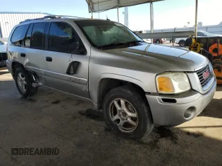2005 GMC Envoy SLE with VIN 1GKDS13S852374516, listed as a Copart auction lot 42409725 with 299,816 mi miles and Salvage Title. Bid and sale history available at carsss.com. Image 4.