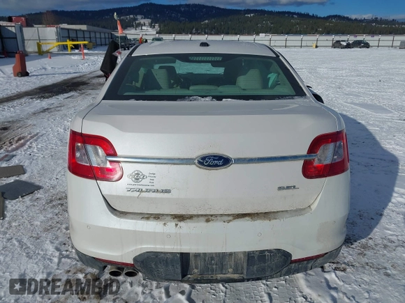 2011 Ford Taurus SEL z VIN 1FAHP2EW2BG143071, wystawiony jako IAAI lot #41538097 z przebiegiem 126 668 mil mil oraz . Historia ofert i sprzedaży dostępna na DreamBid. Obrazek 16.