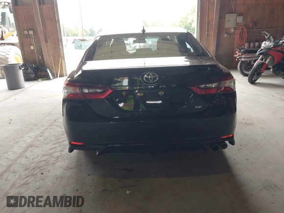 2021 Toyota Camry SE Nightshade with VIN 4T1G11AK6MU580771, listed as a IAAI auction lot 40042967 with 106,579 mi miles. Bid and sale history available at carsss.com. Image 16.