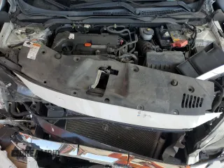 2017 Honda Civic LX z VIN 19XFC2F57HE044404, wystawiony jako Copart lot #58196105 z przebiegiem 117 664 mil mil oraz Szkoda całkowita • Salvage title. Historia ofert i sprzedaży dostępna na DreamBid. Obrazek 11.