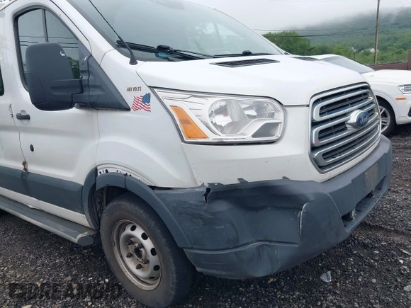 2018 Ford Transit with VIN 1FTYR1ZM1JKB18598, listed as a IAAI auction lot 42533470 with 215,015 mi miles and . Bid and sale history available at DreamBid. Image 6.