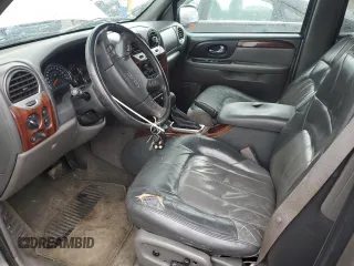 2002 GMC Envoy SLT with VIN 1GKDT13S222296226, listed as a Copart auction lot 51599295 with 148,653 mi miles and Salvage Title. Bid and sale history available at carsss.com. Image 7.