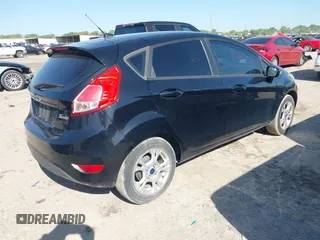 2016 Ford Fiesta SE z VIN 3FADP4EJ3GM146945, wystawiony jako IAAI lot #41975149 z przebiegiem 186 421 mil mil oraz . Historia ofert i sprzedaży dostępna na DreamBid. Obrazek 4.