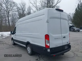 2020 Ford Transit Cargo with VIN 1FTBW3XG0LKB42773, listed as a IAAI auction lot 41564980 with 57,124 mi miles and . Bid and sale history available at carsss.com. Image 3.