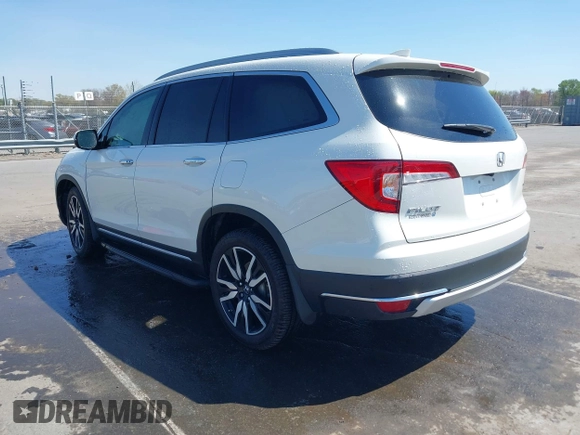 2019 Honda Pilot Touring 8-Passenger z VIN 5FNYF5H93KB021978, wystawiony jako IAAI lot #41915333 z przebiegiem 82 676 mil mil oraz . Historia ofert i sprzedaży dostępna na DreamBid. Obrazek 3.