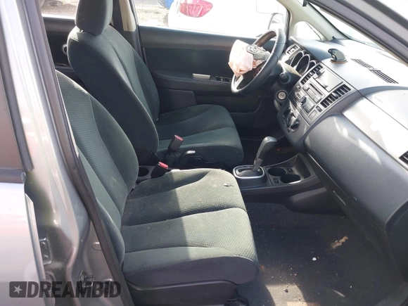 2012 Nissan Versa S with VIN 3N1BC1CPXCK229848, listed as a IAAI auction lot 41955230 with 194,702 mi miles. Bid and sale history available at carsss.com. Image 5.