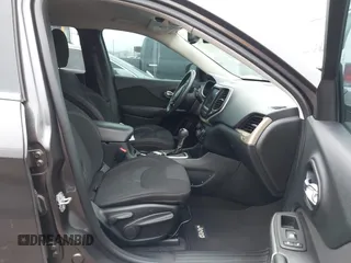 2015 Jeep Cherokee Latitude with VIN 1C4PJLCB6FW547788, listed as a IAAI auction lot 42177621 with 138,945 mi miles and . Bid and sale history available at carsss.com. Image 5.