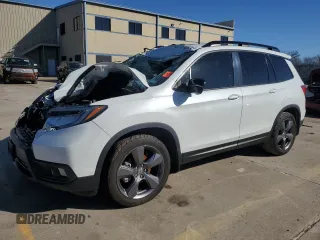 2021 Honda Passport Touring z VIN 5FNYF7H99MB009607, wystawiony jako Copart lot #86992664 z przebiegiem Nie podano mil oraz Szkoda całkowita • Salvage title. Historia ofert i sprzedaży dostępna na DreamBid. Obrazek 1.