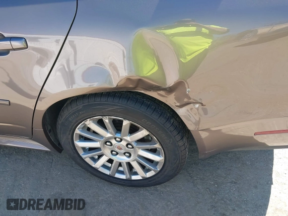 2012 Cadillac CTS with VIN 1G6DA5E51C0148519, listed as a IAAI auction lot 41898211 with 92,220 mi miles and . Bid and sale history available at DreamBid. Image 6.