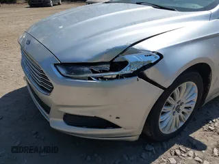 2014 Ford Fusion SE Hybrid with VIN 3FA6P0LU3ER251631, listed as a IAAI auction lot 41917855 with 88,076 mi miles. Bid and sale history available at carsss.com. Image 6.
