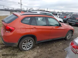 2015 BMW X1 xDrive28i with VIN WBAVL1C50FVY41206, listed as a IAAI auction lot 41508136 with 102,725 mi miles. Bid and sale history available at carsss.com. Image 13.