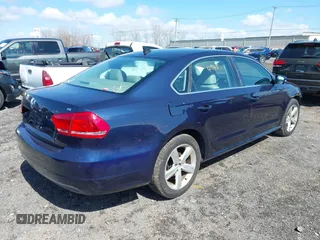 2013 Volkswagen Passat SE w/Sunroof & Nav with VIN 1VWBP7A30DC074235, listed as a IAAI auction lot 41967875 with 153,803 mi miles. Bid and sale history available at carsss.com. Image 4.