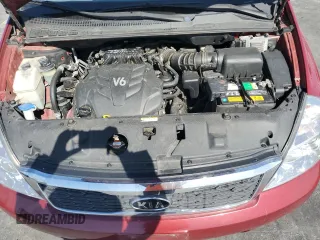 2011 Kia Sedona LX with VIN KNDMG4C75B6410550, listed as a Copart auction lot 76997744 with 74,659 mi miles and Salvage Title. Bid and sale history available at carsss.com. Image 13.