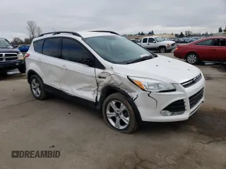 2014 Ford Escape SE with VIN 1FMCU9GX2EUB46825, listed as a Copart auction lot 44631105 with 133,827 mi miles and Salvage Title. Bid and sale history available at carsss.com. Image 4.