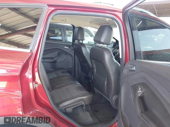 2013 Ford Escape Titanium with VIN 1FMCU0J96DUB08681, listed as a IAAI auction lot 42068864 with 102,094 mi miles and . Bid and sale history available at carsss.com. Image 8.