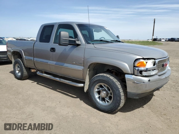 2000 GMC Sierra 2500 SLE z VIN 1GTGK29U1YE324924, wystawiony jako Copart lot #56182795 z przebiegiem 349 358 mil mil oraz Szkoda całkowita • Salvage title. Historia ofert i sprzedaży dostępna na DreamBid. Obrazek 4.