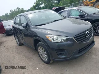 2016 Mazda CX-5 Sport with VIN JM3KE4BY3G0662774, listed as a IAAI auction lot 42658672 with 135,504 mi miles and . Bid and sale history available at DreamBid. Image 1.