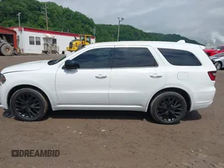 2015 Dodge Durango SXT with VIN 1C4RDJAG6FC786715, listed as a IAAI auction lot 42328713 with 165,651 mi miles and . Bid and sale history available at DreamBid. Image 14.
