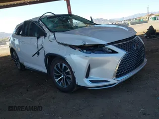 2021 Lexus RX with VIN 2T2AZMAA7MC214144, listed as a IAAI auction lot 41852168 with 57,685 mi miles. Bid and sale history available at carsss.com. Image 1.