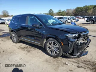 2021 Cadillac XT6 Premium Luxury z VIN 1GYKPCRS8MZ108761, wystawiony jako Copart lot #87185084 z przebiegiem 39 701 mil mil oraz Szkody całkowita. Historia ofert i sprzedaży dostępna na DreamBid. Obrazek 4.