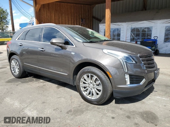 2019 Cadillac XT5 Luxury AWD with VIN 1GYKNDRS0KZ229941, listed as a Copart auction lot 49457315 with 48,856 mi miles and Salvage Title. Bid and sale history available at carsss.com. Image 4.