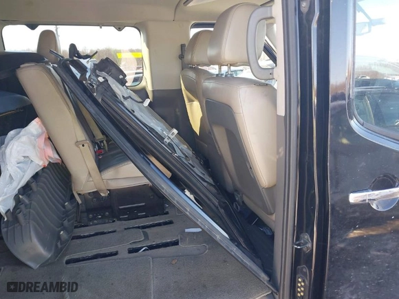 2017 Nissan NV Passenger SL with VIN 5BZAF0AA4HN850383, listed as a IAAI auction lot 41310673 with 122,120 mi miles. Bid and sale history available at carsss.com. Image 8.