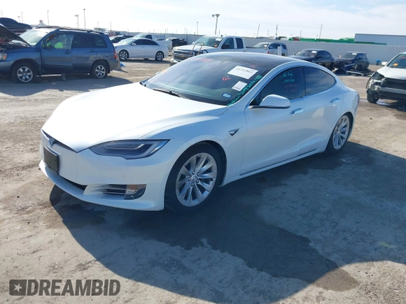 2020 Tesla Model S Long Range with VIN 5YJSA1E23LF360441, listed as a IAAI auction lot 41312865 with 68,967 mi miles and . Bid and sale history available at DreamBid. Image 19.
