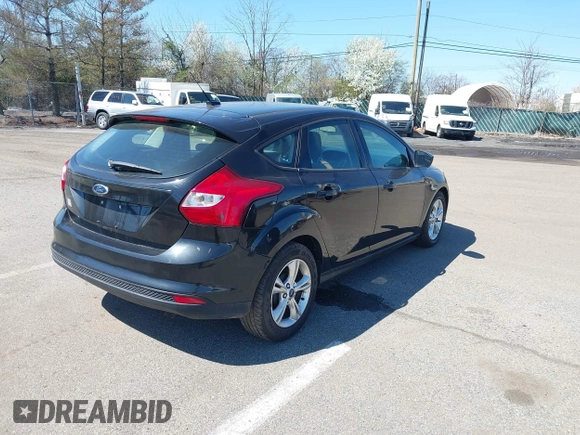 2012 Ford Focus SE with VIN 1FAHP3K20CL149774, listed as a IAAI auction lot 41991130 with 205,454 mi miles and . Bid and sale history available at carsss.com. Image 4.