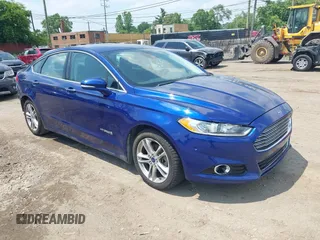 2016 Ford Fusion Titanium Hybrid with VIN 3FA6P0RU4GR183298, listed as a IAAI auction lot 42690489 with 115,627 mi miles and . Bid and sale history available at DreamBid. Image 1.