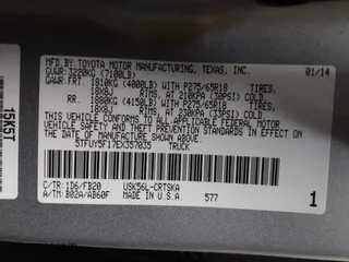 2014 Toyota Tundra 4WD Truck SR with VIN 5TFUY5F17EX357035, listed as a IAAI auction lot 39928076 with 129,831 mi miles. Bid and sale history available at carsss.com. Image 9.