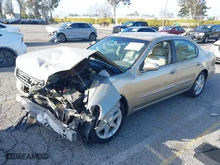 2002 Infiniti I35 Luxury with VIN JNKDA31A52T027346, listed as a IAAI auction lot 41709863 with 227,266 mi miles. Bid and sale history available at carsss.com. Image 2.