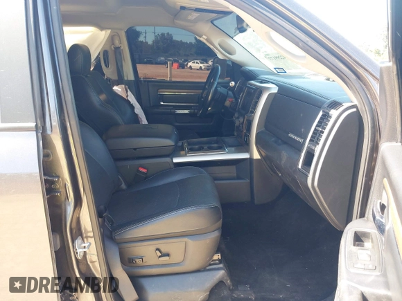 2015 Ram 2500 Laramie z VIN 3C6UR5FL6FG708769, wystawiony jako IAAI lot #42299173 z przebiegiem 101 660 mil mil oraz . Historia ofert i sprzedaży dostępna na DreamBid. Obrazek 5.