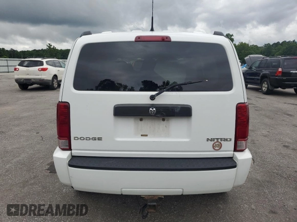 2011 Dodge Nitro Heat z VIN 1D4PU4GK9BW529192, wystawiony jako Copart lot #58587275 z przebiegiem 101 538 mil mil oraz Szkoda całkowita • Salvage title. Historia ofert i sprzedaży dostępna na DreamBid. Obrazek 6.