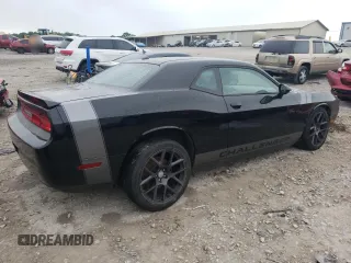 2013 Dodge Challenger SXT z VIN 2C3CDYAG6DH515778, wystawiony jako Copart lot #55976665 z przebiegiem 160 194 mil mil oraz Szkoda całkowita • Salvage title. Historia ofert i sprzedaży dostępna na DreamBid. Obrazek 3.