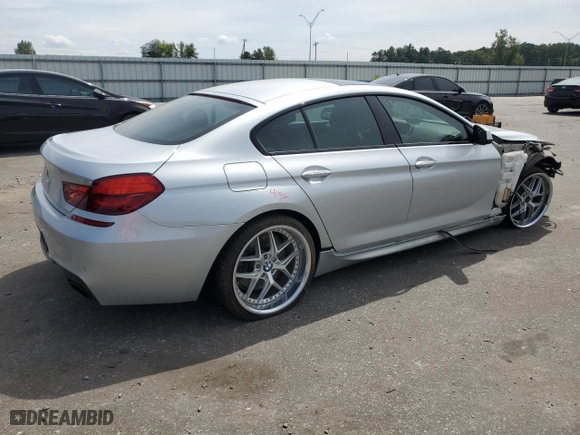 2015 BMW 6 Series 650i with VIN WBA6B2C58FGB99581, listed as a Copart auction lot 71403354 with 89,545 mi miles and Salvage Title. Bid and sale history available at carsss.com. Image 3.