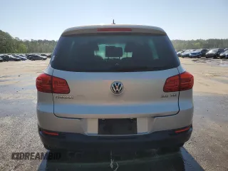 2012 Volkswagen Tiguan SE z VIN WVGAV7AX6CW543053, wystawiony jako Copart lot #53160825 z przebiegiem 167 185 mil mil oraz Szkody całkowita. Historia ofert i sprzedaży dostępna na DreamBid. Obrazek 6.