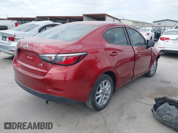 2016 Scion iA with VIN 3MYDLBZV2GY146808, listed as a IAAI auction lot 42049448 with 116,042 mi miles. Bid and sale history available at carsss.com. Image 4.