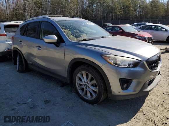 2015 Mazda CX-5 Grand Touring with VIN JM3KE4DY5F0460465, listed as a Copart auction lot 46392605 with 103,185 mi miles and Salvage Title. Bid and sale history available at carsss.com. Image 4.