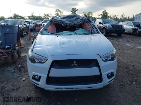 2011 Mitsubishi Outlander SE z VIN JA4AP4AU1BZ021926, wystawiony jako IAAI lot #42269085 z przebiegiem 113 010 mil mil oraz . Historia ofert i sprzedaży dostępna na DreamBid. Obrazek 12.