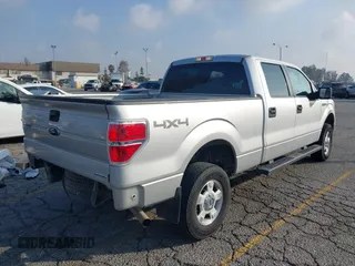 2014 Ford F-150 XL with VIN 1FTFW1EF9EKF99892, listed as a IAAI auction lot 41428456 with 128,659 mi miles and . Bid and sale history available at carsss.com. Image 4.