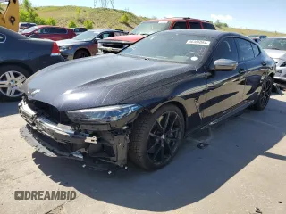 2021 BMW 8 Series M850i with VIN WBAGV8C00MCF55108, listed as a Copart auction lot 56305084 with 27,399 mi miles and Salvage Title. Bid and sale history available at carsss.com. Image 1.