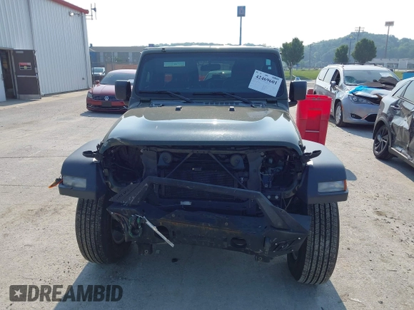 2023 Jeep Wrangler Willys with VIN 1C4HJXDG7PW646627, listed as a IAAI auction lot 42469601 with 50,178 mi miles and . Bid and sale history available at DreamBid. Image 13.