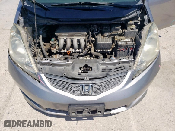2009 Honda Fit Sport w/Navi with VIN JHMGE88649S008738, listed as a Copart auction lot 53961345 with 282,290 mi miles and Salvage Title. Bid and sale history available at carsss.com. Image 11.