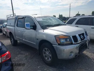 2004 Nissan Titan LE z VIN 1N6AA07B44N590802, wystawiony jako IAAI lot #42699726 z przebiegiem 221 879 mil mil oraz . Historia ofert i sprzedaży dostępna na DreamBid. Obrazek 1.