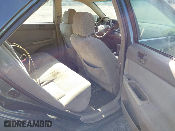 2004 Toyota Camry LE with VIN 4T1BF32K04U074276, listed as a IAAI auction lot 41940050 with 266,420 mi miles and . Bid and sale history available at DreamBid. Image 8.