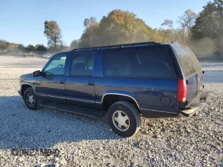 1999 Chevrolet Suburban with VIN 3GNEC16R3XG257322, listed as a Copart auction lot 77601224 with 196,923 mi miles and Salvage Title. Bid and sale history available at carsss.com. Image 2.