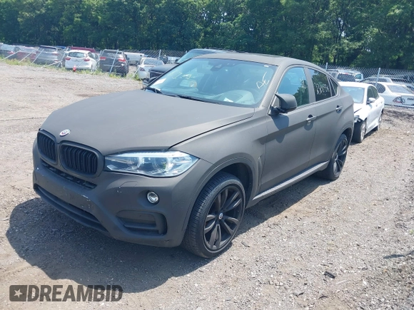 2016 BMW X6 xDrive35i z VIN 5UXKU2C5XG0N83220, wystawiony jako IAAI lot #39197569 z przebiegiem Nie podano mil oraz . Historia ofert i sprzedaży dostępna na DreamBid. Obrazek 17.